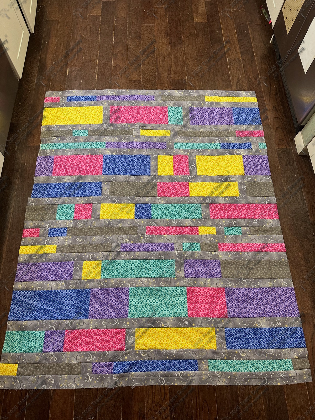 Finished original quilt by Trace Downey.