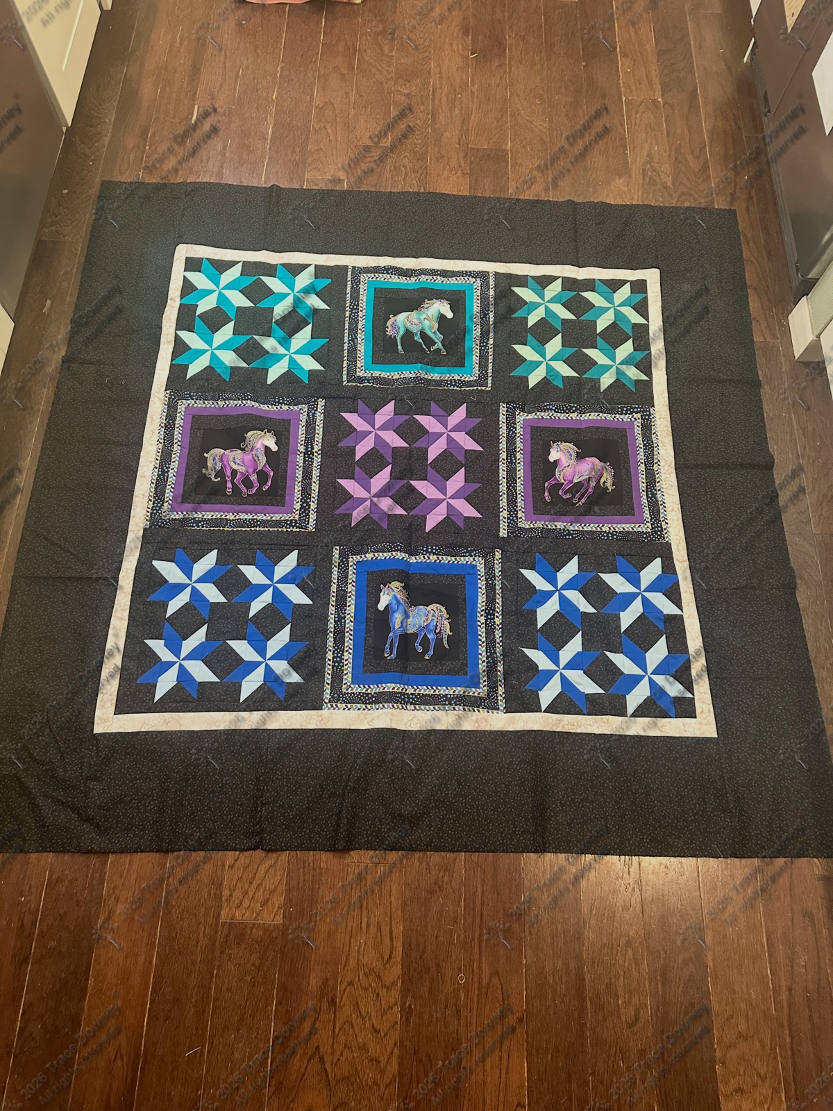 Finished original quilt by Trace Downey.