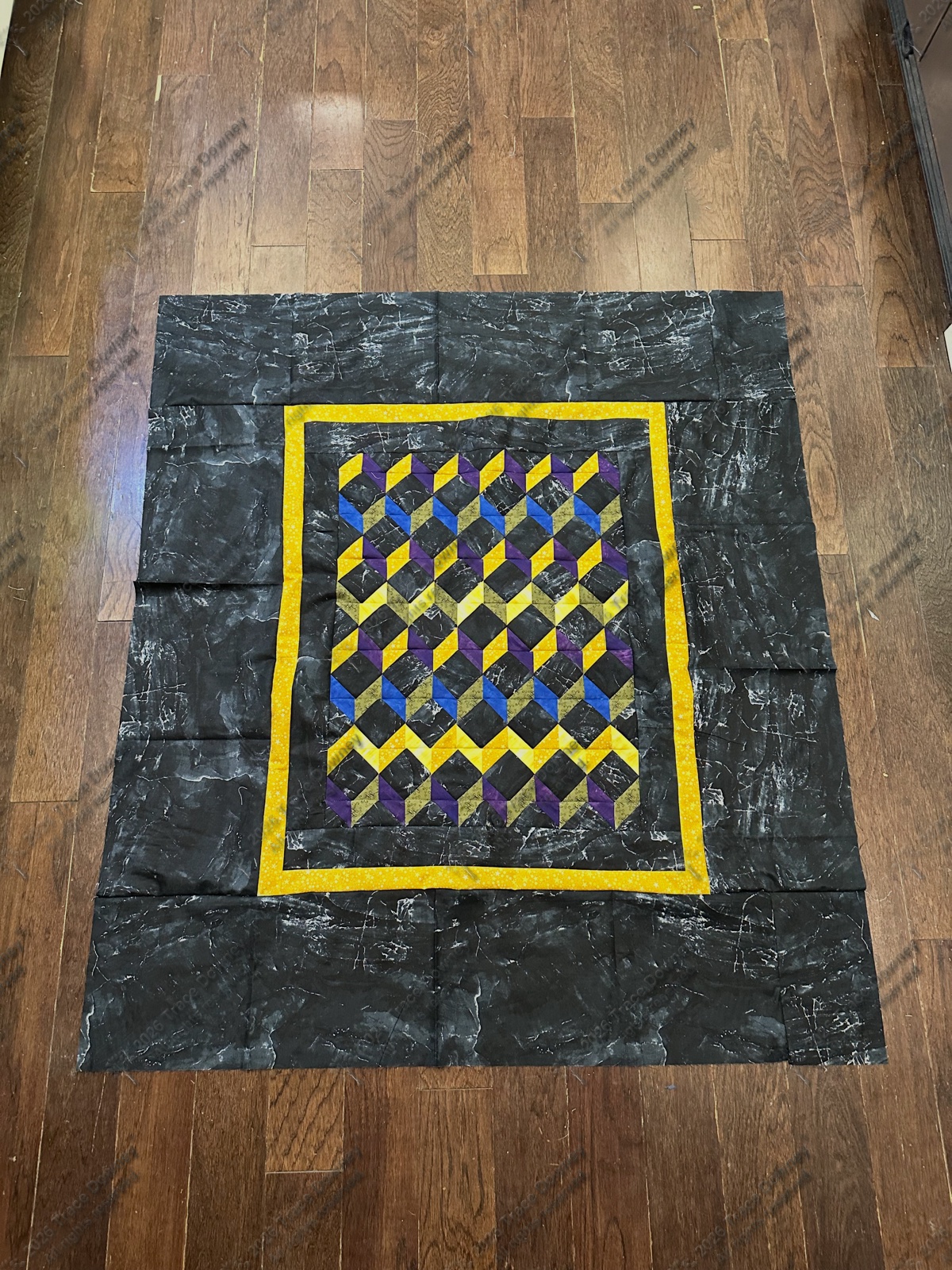 Finished original quilt by Trace Downey.