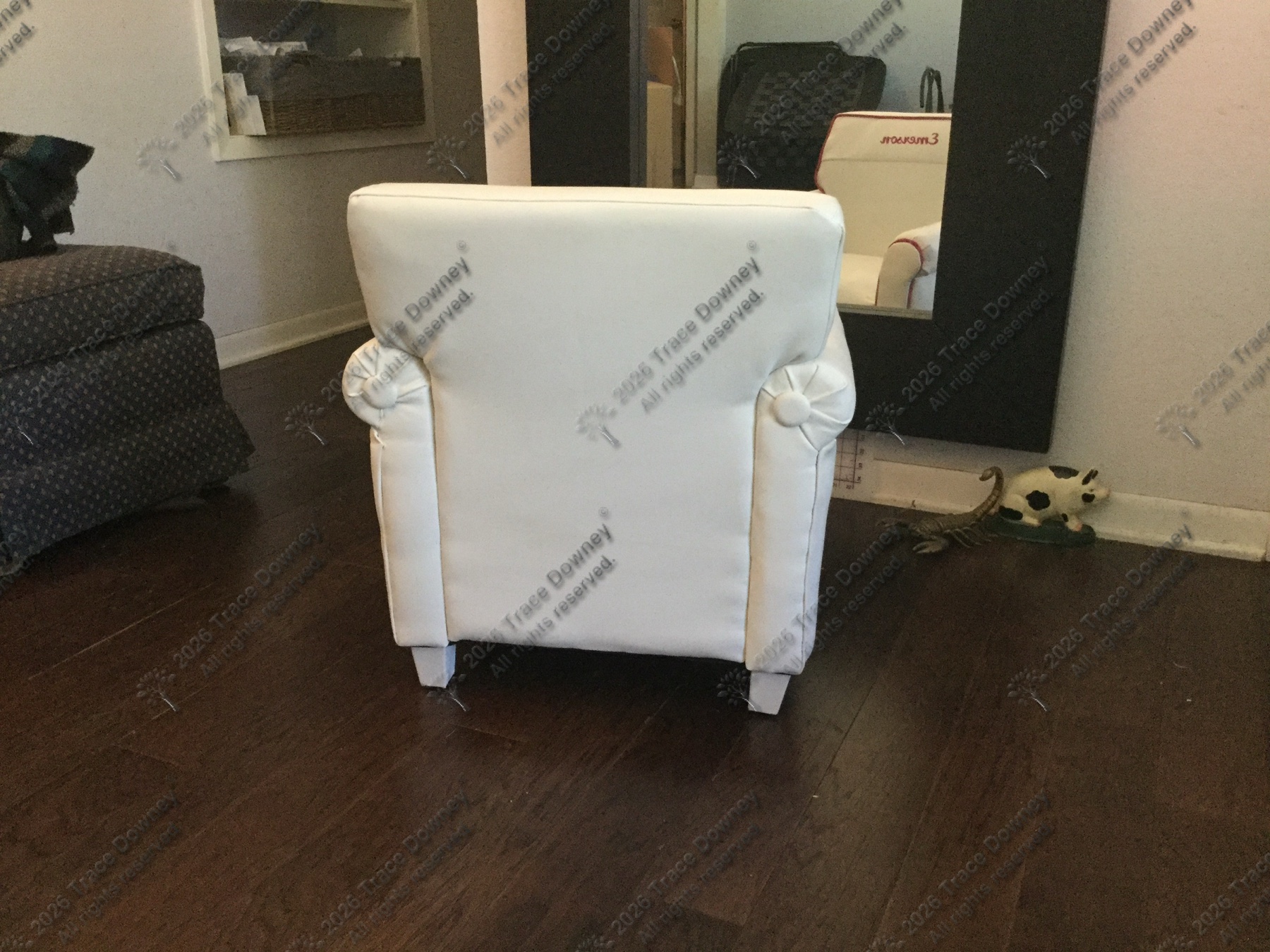 Back view of the finished white chair with red piping.